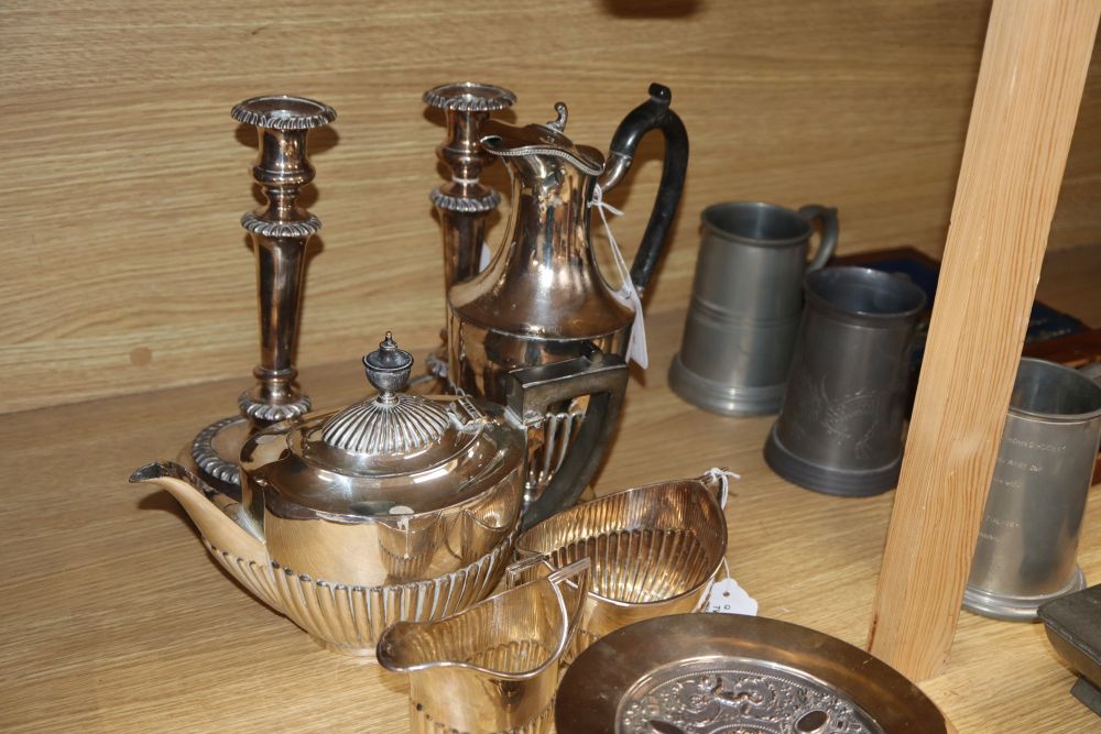 A pair of plated candlesticks, height 25cm and a small quantity of other plated items